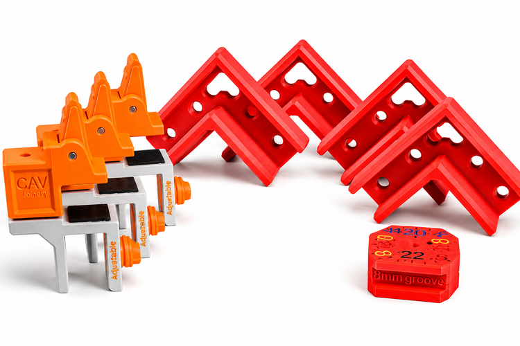 Set of red 90 degree corner squares, orange adjustable scribing clamps, and red scribing block on a clean white background
